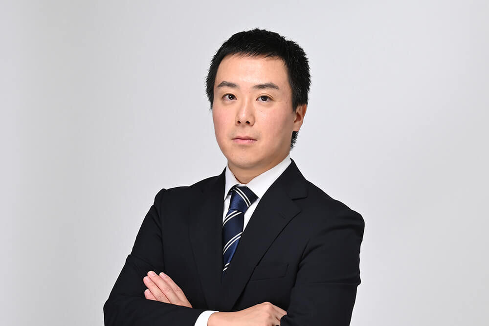 小山　賢一